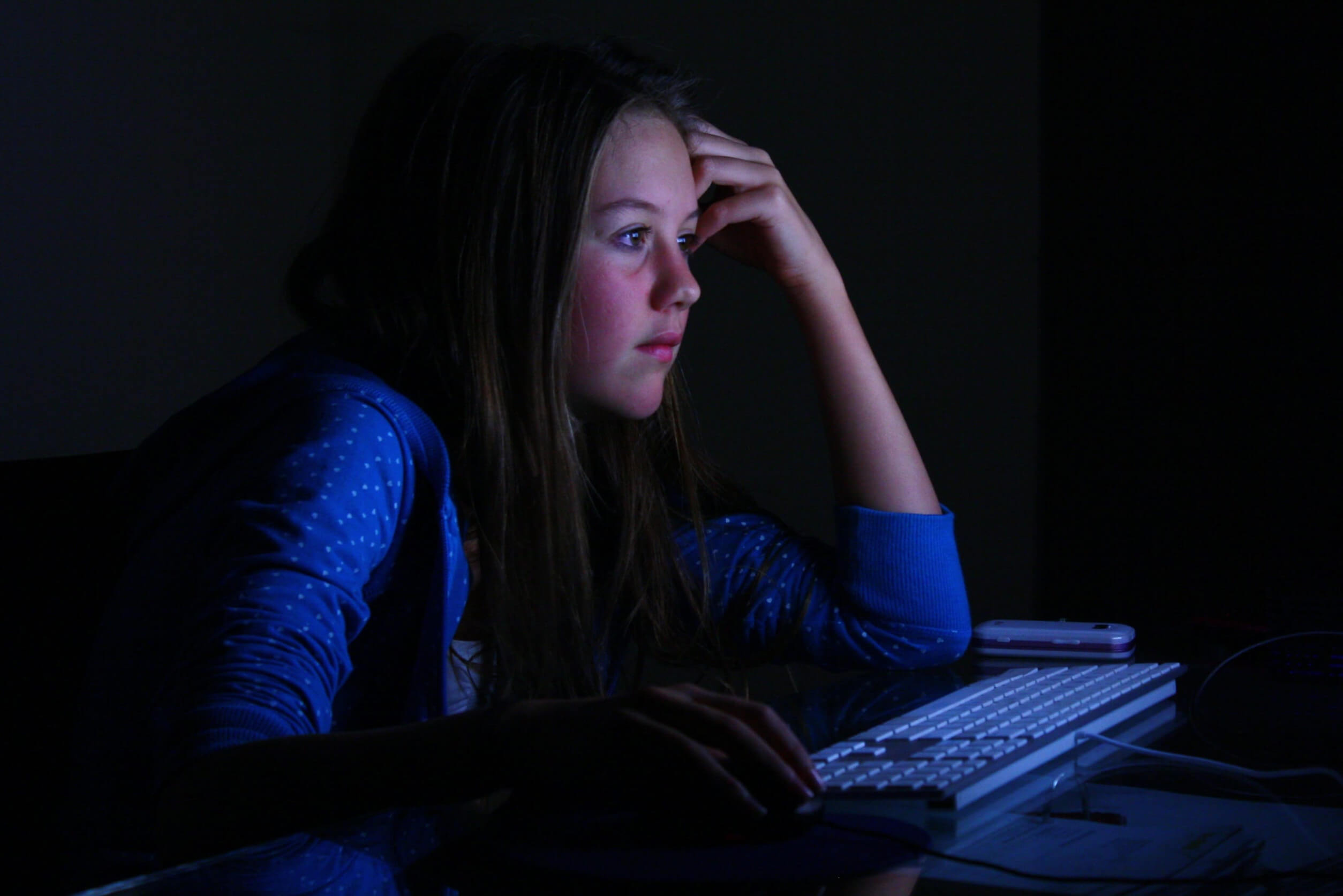 A woman using a computer to complete the One Call Now opt out process.